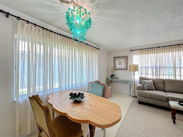 dining area with a textured ceiling