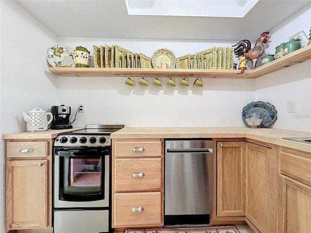 kitchen with wood counters and electric range oven