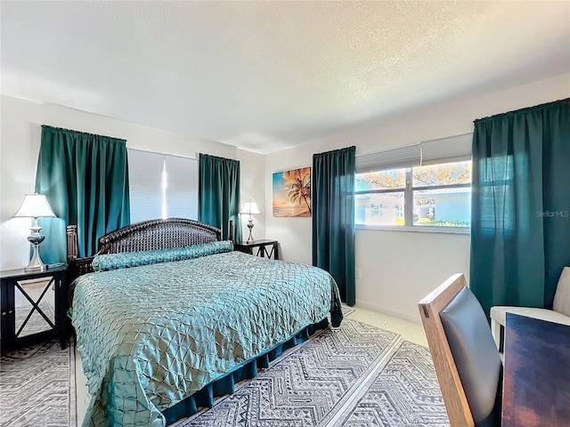 bedroom featuring a textured ceiling