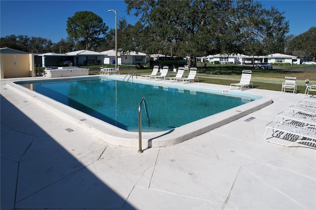 view of pool with a patio