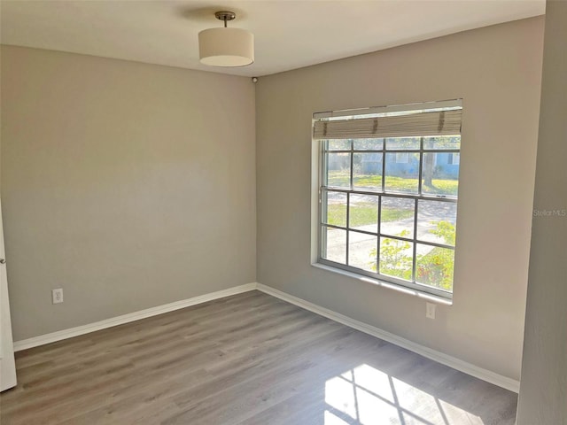 empty room featuring hardwood / wood-style floors