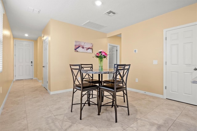 view of tiled dining space