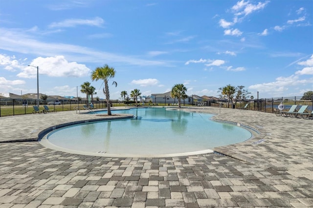 view of pool featuring a patio