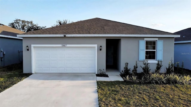 single story home featuring a garage