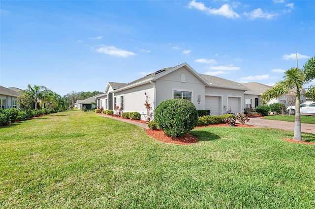 view of property exterior featuring a yard and a garage