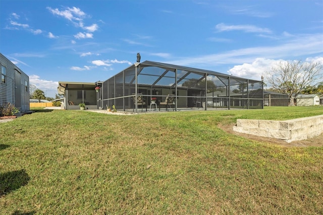 view of yard with a sunroom