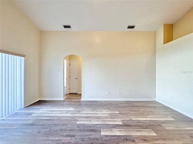 unfurnished room featuring light wood-type flooring