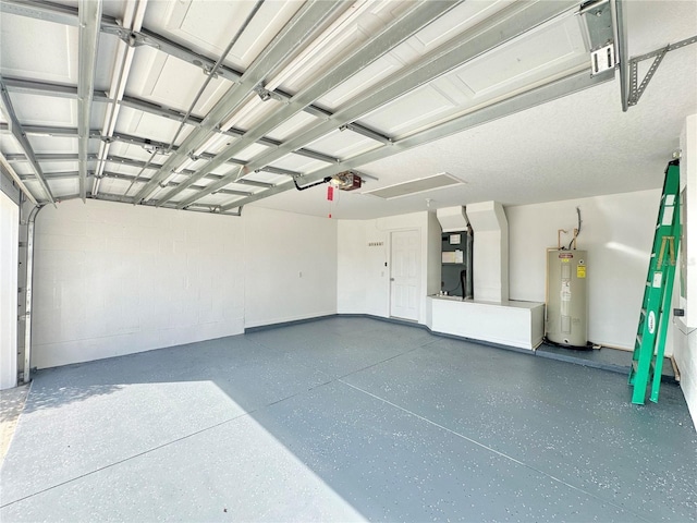 garage featuring a garage door opener, electric water heater, and heating unit