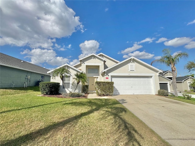 ranch-style house featuring a garage and a front yard