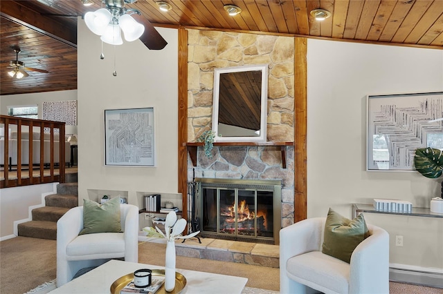 living room featuring carpet, ceiling fan, and wood ceiling