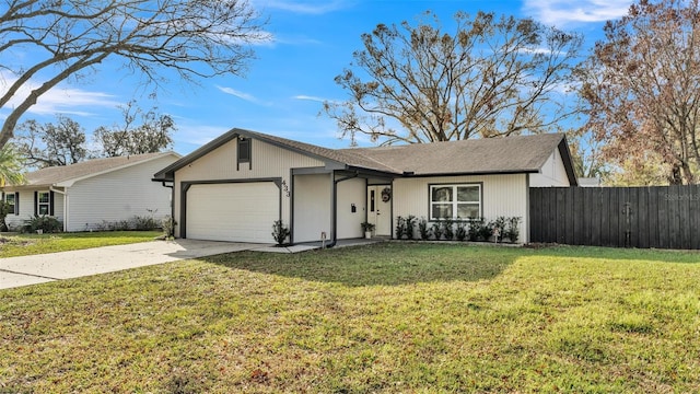 ranch-style house with a garage and a front yard