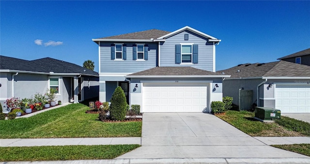 front facade featuring a garage and a front yard