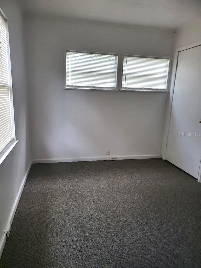 spare room with carpet flooring