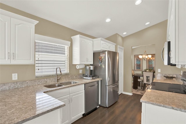 kitchen with white cabinetry, appliances with stainless steel finishes, and sink