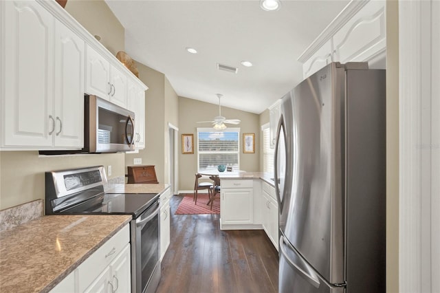 kitchen with lofted ceiling, white cabinetry, pendant lighting, stainless steel appliances, and dark hardwood / wood-style flooring