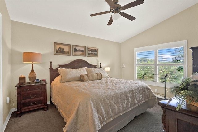 bedroom featuring ceiling fan, dark colored carpet, and vaulted ceiling