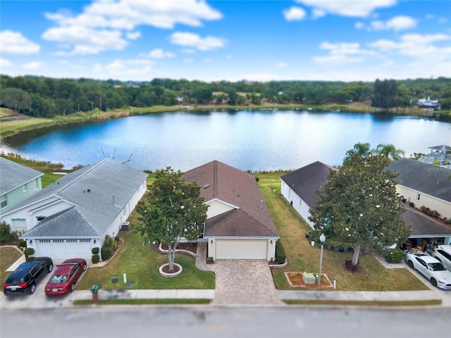 birds eye view of property with a water view
