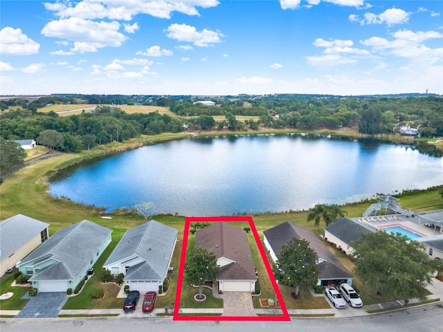 birds eye view of property featuring a water view