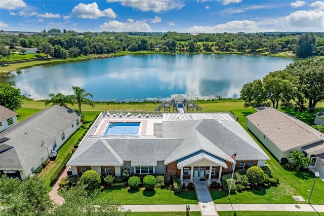 drone / aerial view with a water view