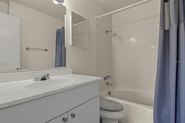 full bathroom featuring vanity, shower / tub combo, and toilet