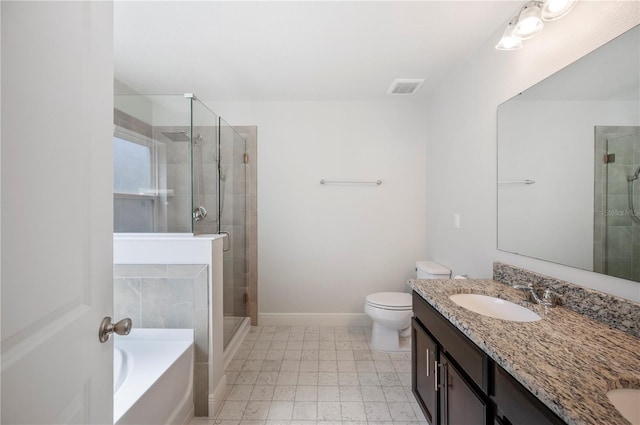 full bathroom with vanity, toilet, and separate shower and tub