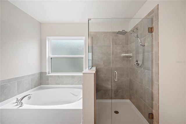 bathroom with independent shower and bath