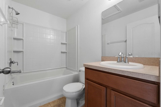 full bathroom featuring vanity, tile patterned floors, washtub / shower combination, and toilet