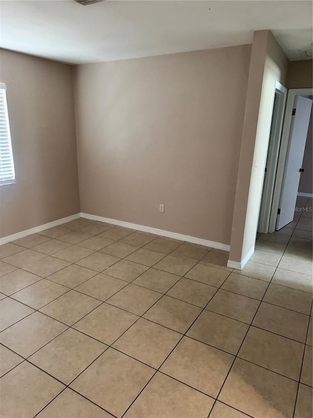 view of tiled spare room