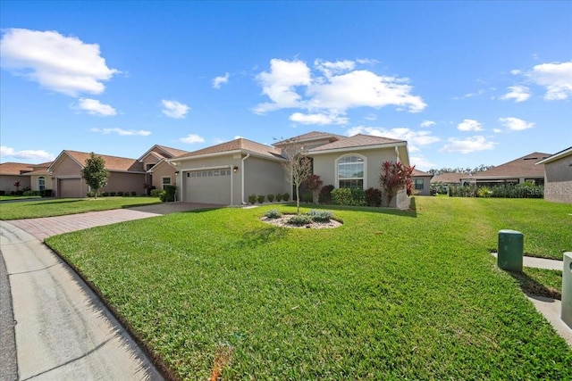 view of front facade featuring driveway, a garage, a residential view, a front lawn, and stucco siding