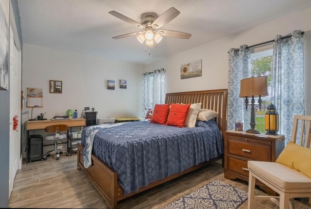 bedroom featuring ceiling fan