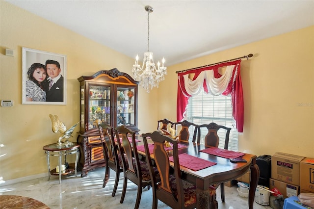 dining room with a chandelier