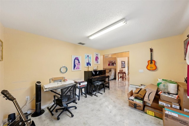 office space featuring a textured ceiling