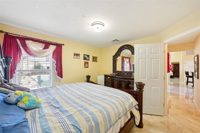 bedroom with a textured ceiling