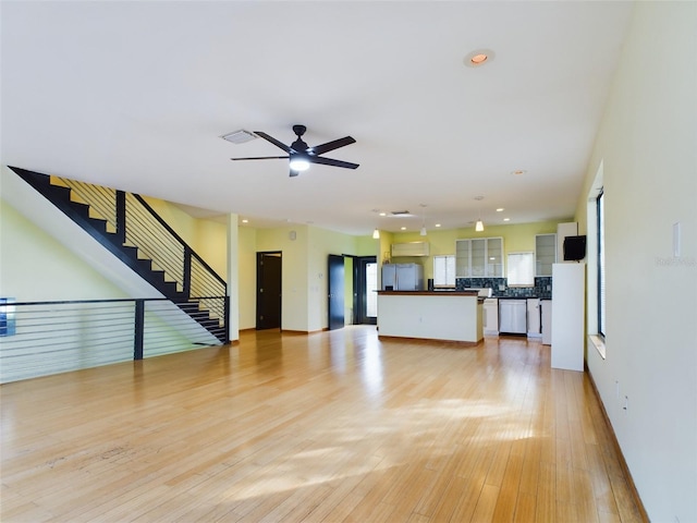 1793 N Fort Harrison Ave, Clearwater, FL 33755 - unfurnished living room with ceiling fan and light hardwood / wood-style floors