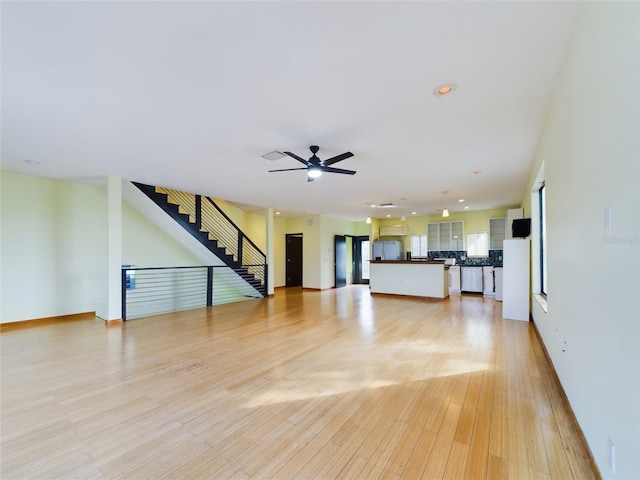 1793 N Fort Harrison Ave, Clearwater, FL 33755 - unfurnished living room with ceiling fan and light wood-type flooring