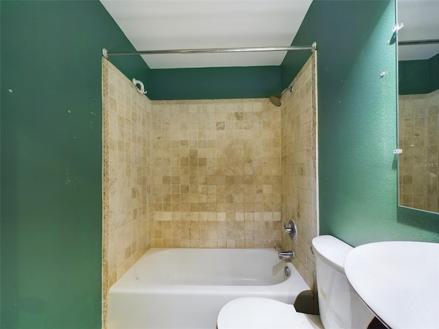 1793 N Fort Harrison Ave, Clearwater, FL 33755 - bathroom with tiled shower / bath and toilet