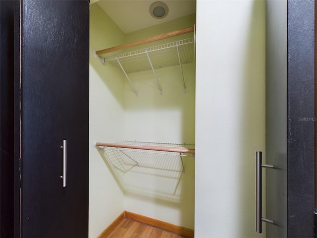 1793 N Fort Harrison Ave, Clearwater, FL 33755 - walk in closet featuring wood-type flooring
