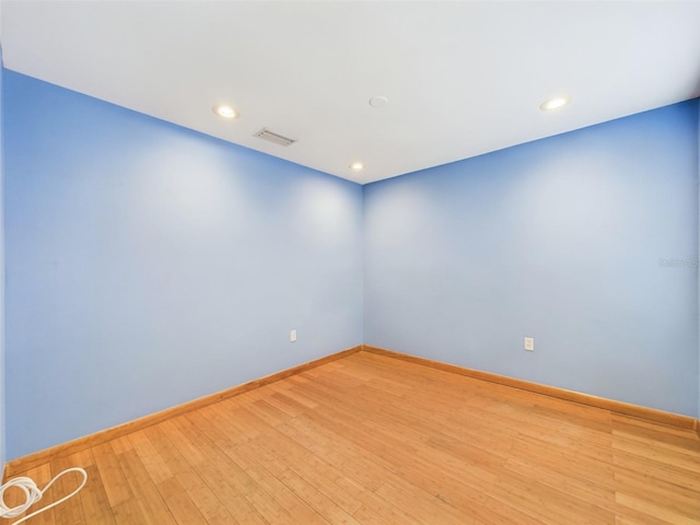 1793 N Fort Harrison Ave, Clearwater, FL 33755 - unfurnished room featuring hardwood / wood-style floors