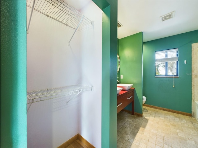 1793 N Fort Harrison Ave, Clearwater, FL 33755 - bathroom featuring vanity and toilet