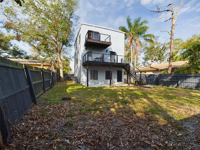 1793 N Fort Harrison Ave, Clearwater, FL 33755 - back of house featuring a yard
