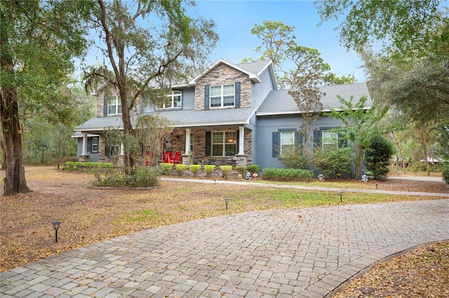 view of front of property with a front lawn and a porch