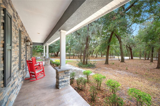 view of patio featuring a porch