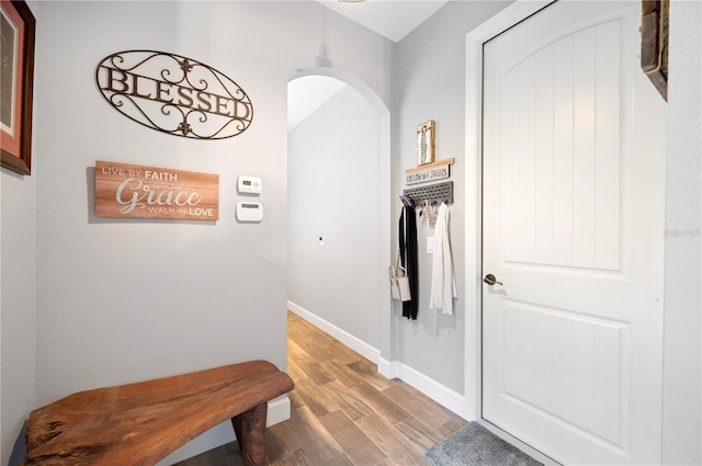 hallway featuring hardwood / wood-style flooring