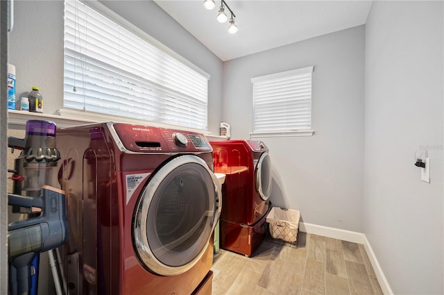 laundry area with separate washer and dryer