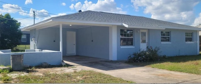 view of front of house with a carport