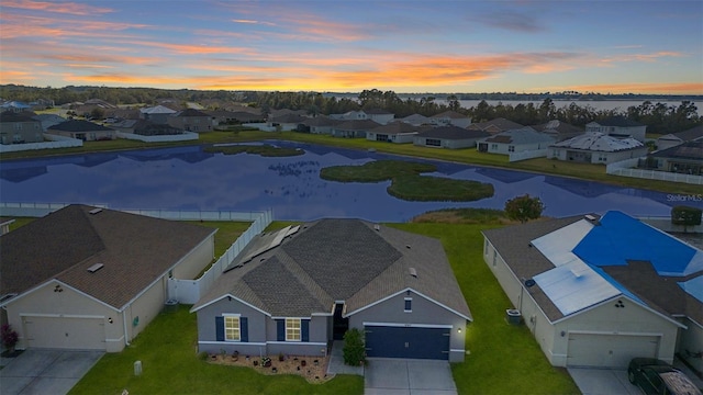 birds eye view of property with a residential view