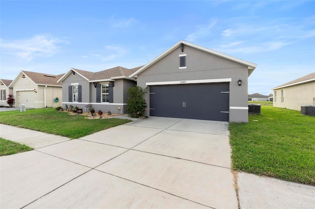 ranch-style home featuring a garage, concrete driveway, stucco siding, cooling unit, and a front yard
