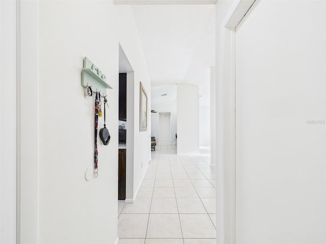 hallway with light tile patterned floors