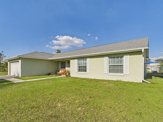 single story home with roof with shingles, stucco siding, an attached garage, fence, and a front lawn