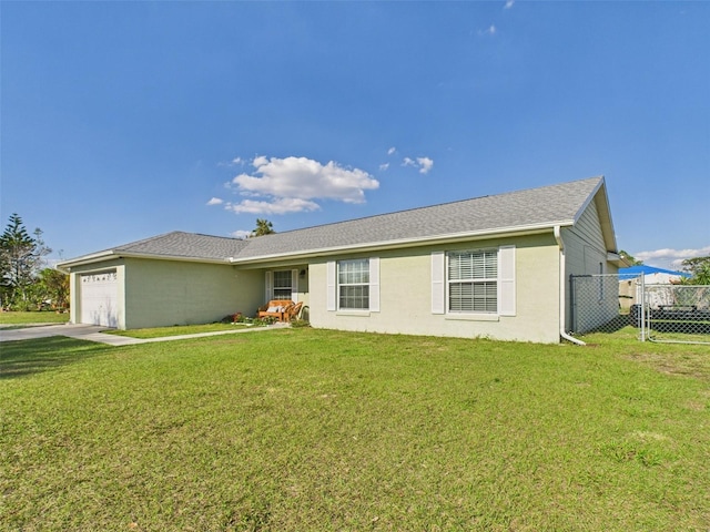 single story home featuring roof with shingles, stucco siding, an attached garage, a front yard, and fence